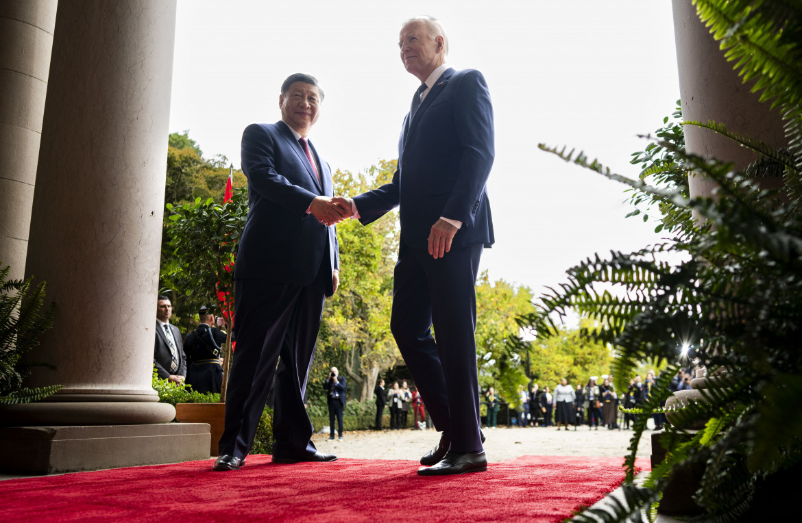 Xi Jinping e Joe Biden AP