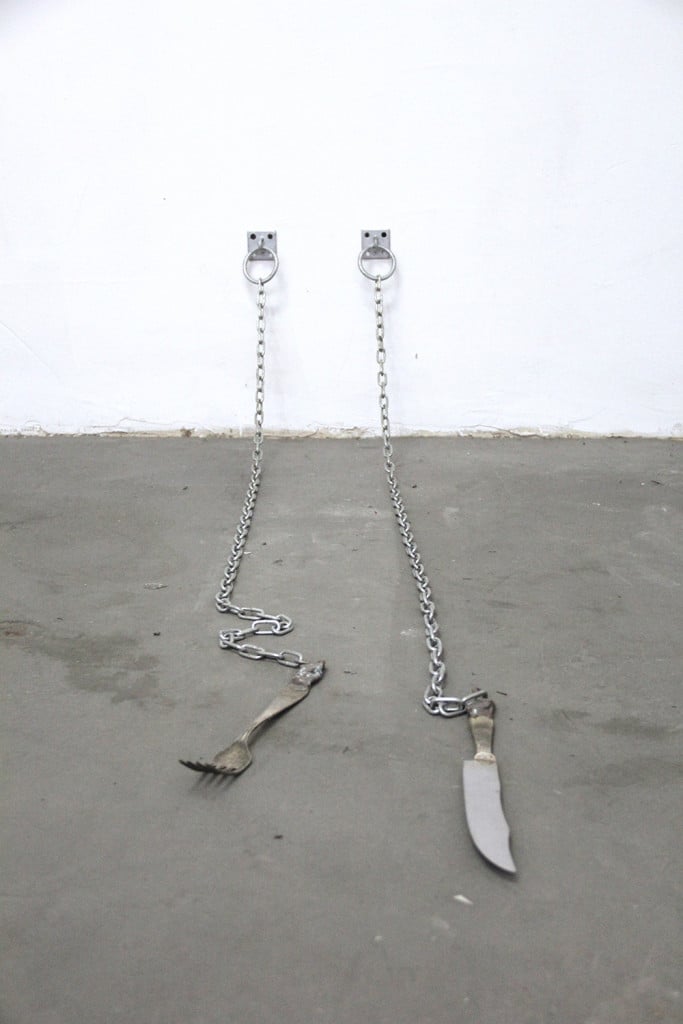 Silvia Giambrone, Cutlery, 2016, posate d’argento, catene di acciaio ancorate a parete