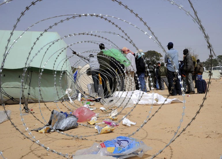 In Tunisia, refugees caught between prison and deportation