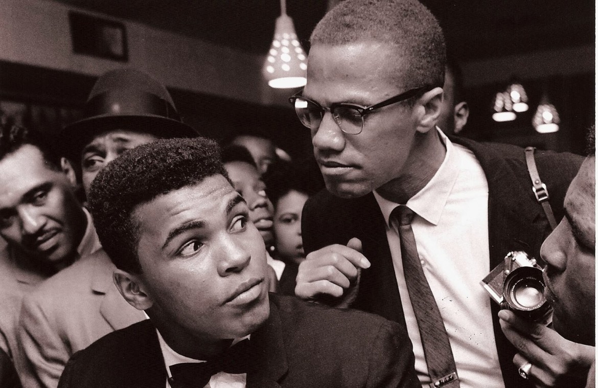 05est1 e2 muhammad-ali Malcolm X kidding around with Muhammad Ali, New York, 1963