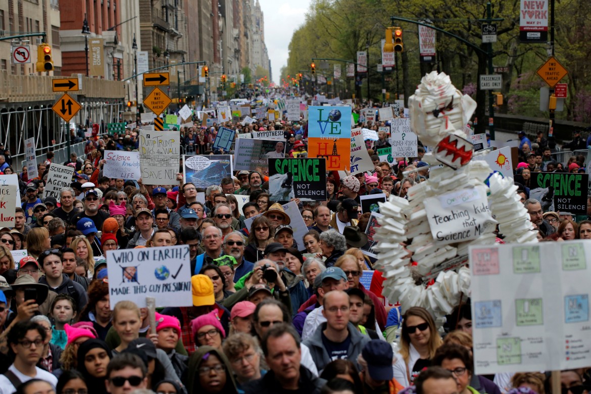 Protesters line Central Park West during the Earth Day 'March For Science NYC' demonstration to coincide with similar marches globally in Manhattan, New York, U.S., April 22, 2017. REUTERS/Andrew Kelly