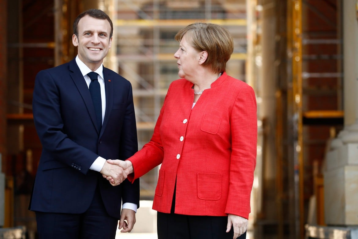 Macron-Merkel uniti sull’Iran, divisi dal debito