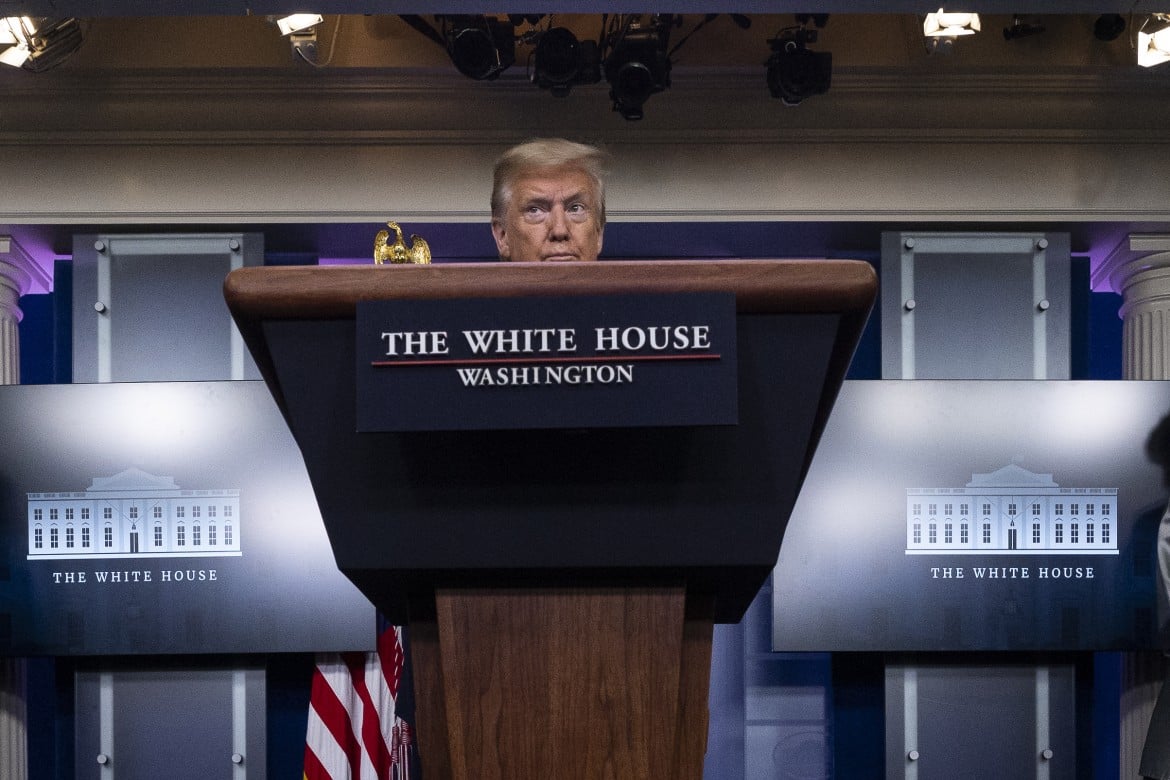 Briefing di Trump alla Casa bianca sull'epidemia, foto Ap /LaPresse