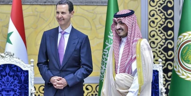 I nemici Zelensky e Assad padroni della scena a Gedda