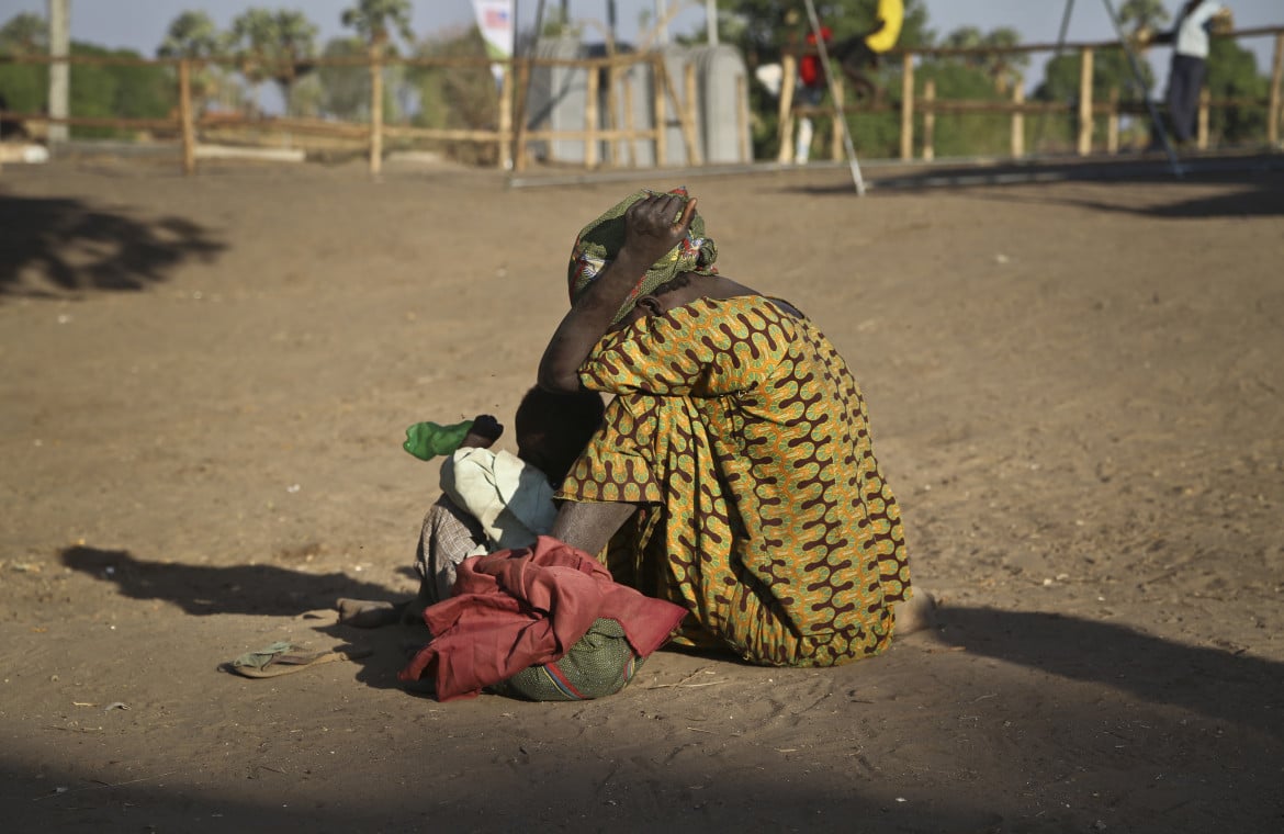 Una donna sudanese in un campo profughi in Uganda