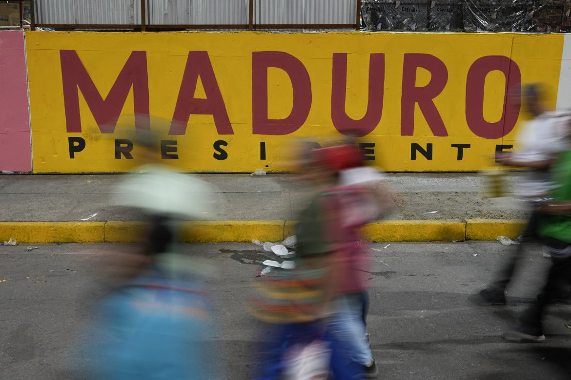 Sostenitori di Maduro per le strade di Caracas (AP Photo/Matias Delacroix)