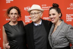 Directors Rachel Grady, left, and Heidi Ewing, right, pose with Norman Lear at the premiere of 
