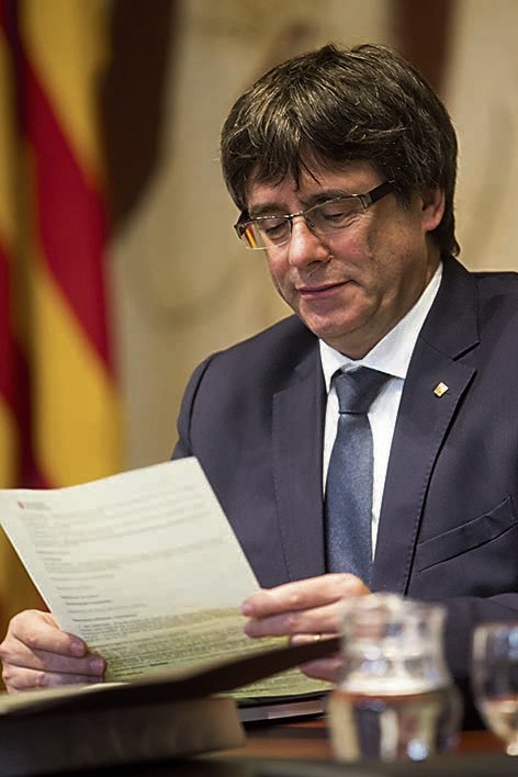 Catalan president, Carles Puigdemont, chairs the regional Cabinet meeting in Barcelona, northeastern Spain, on 26 September 2017. Catalonia is to hold an independence referendum on 01 October 2017 in spite of it has been suspended by the Constitutional Court. EFE/Quique García