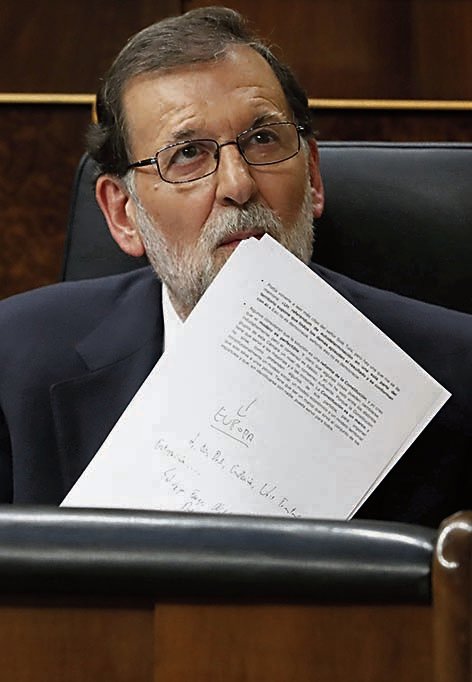 Spanish Prime Minister Mariano Rajoy attends the Question Time at the Lower House in Madrid, Spain, 11 October 2017. The Government will undergo Question Time a day after Catalonia's regional President Carles Puigdemont declared the region's independence but suspended its effects immediately for a few weeks to search a dialogue with the Spanish Central Government. EFE/Javier Lizon